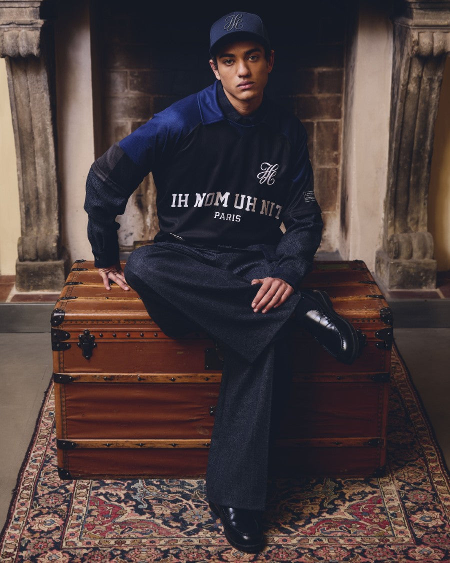 CIH NOM UH NIT Fall/Winter 2026 look with Monogram Embroidered Cap, Short Sleeve Tech Jersey and wide-leg flannel pants