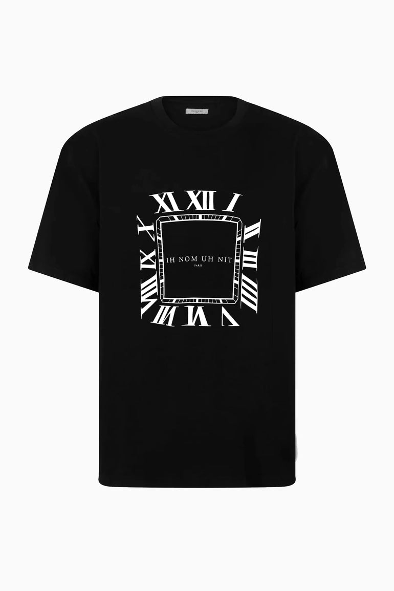Black IH NOM UH NIT T-shirt featuring watch-face graphic with Roman numerals.