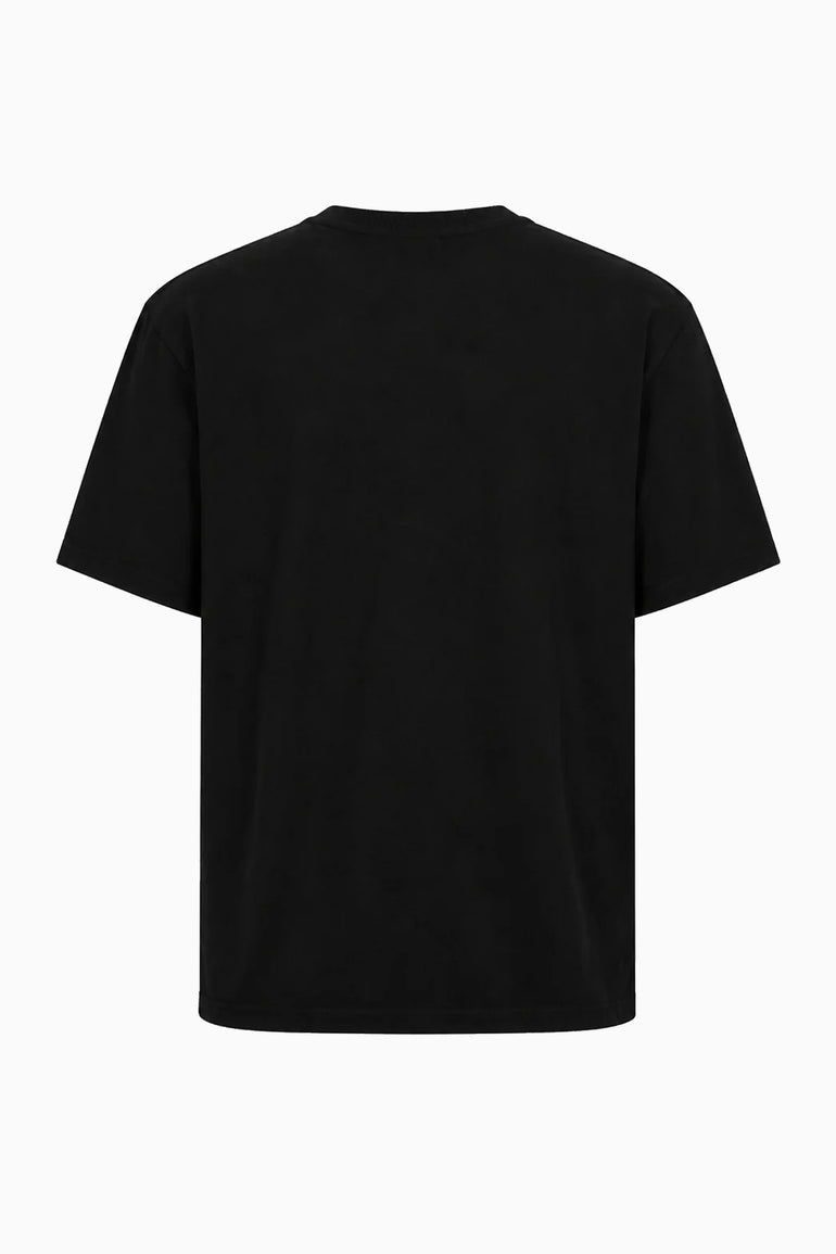 IH NOM UH NIT brown cotton T-shirt featuring the Family Print artwork with a Dobermann and editorial fashion portrait