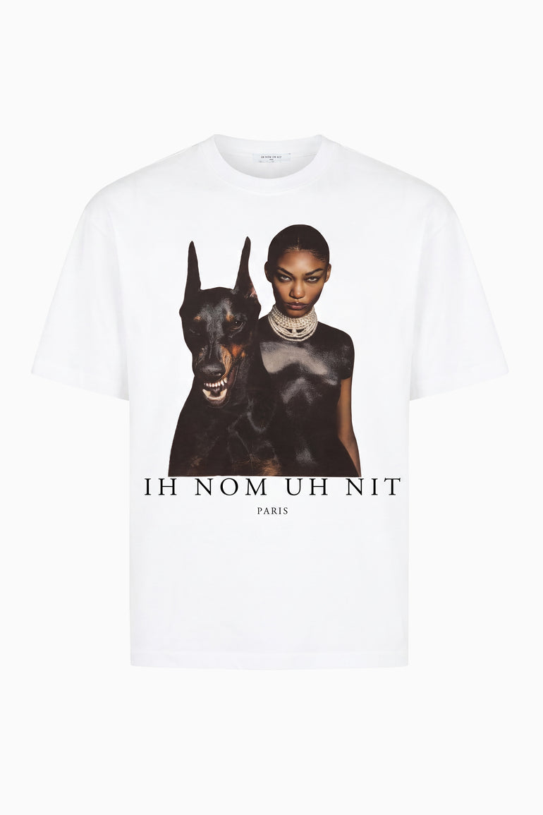IH NOM UH NIT brown cotton T-shirt featuring the Family Print artwork with a Dobermann and editorial fashion portrait