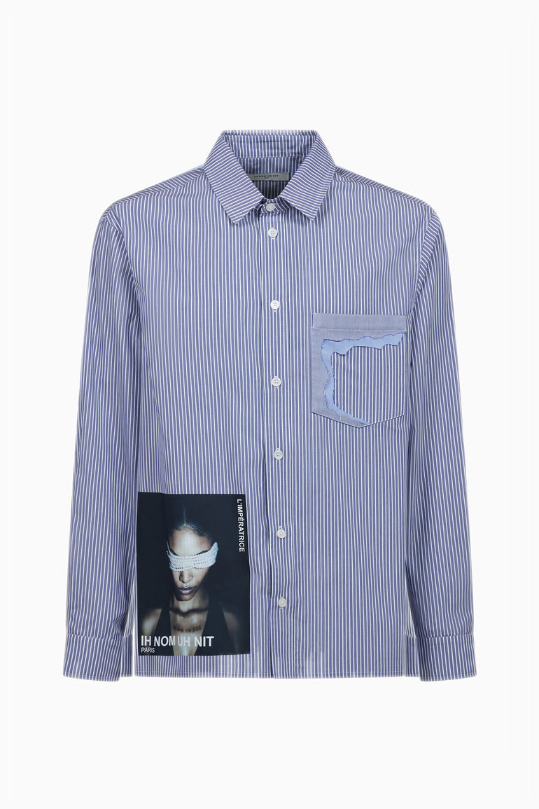 IH NOM UH NIT FW26 blue and white striped cotton shirt with IH NOM UH NIT PARIS logo across the upper back
