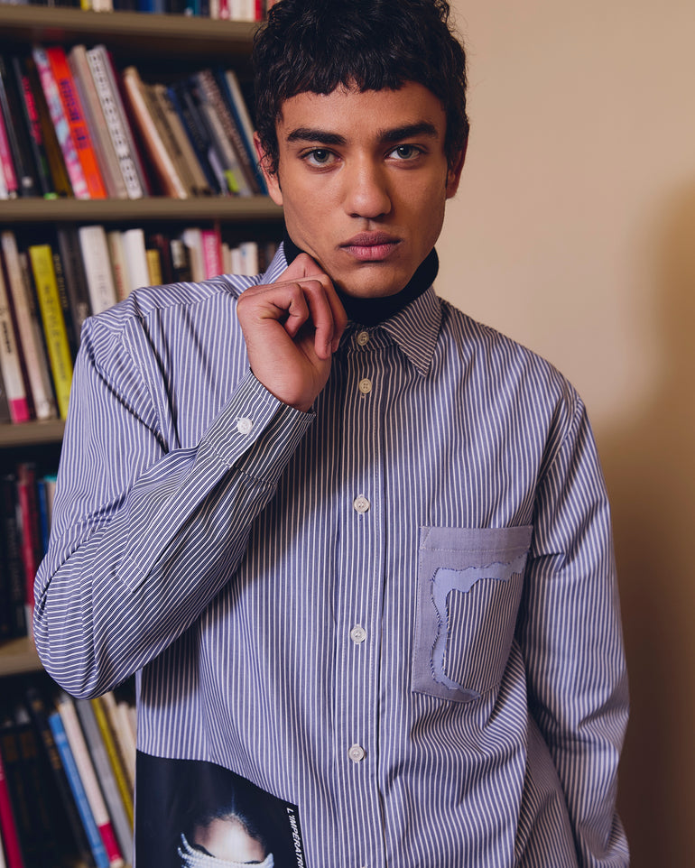 IH NOM UH NIT FW26 blue and white striped cotton shirt with L'Impératrice photographic artwork and contrast chest pocket, front view