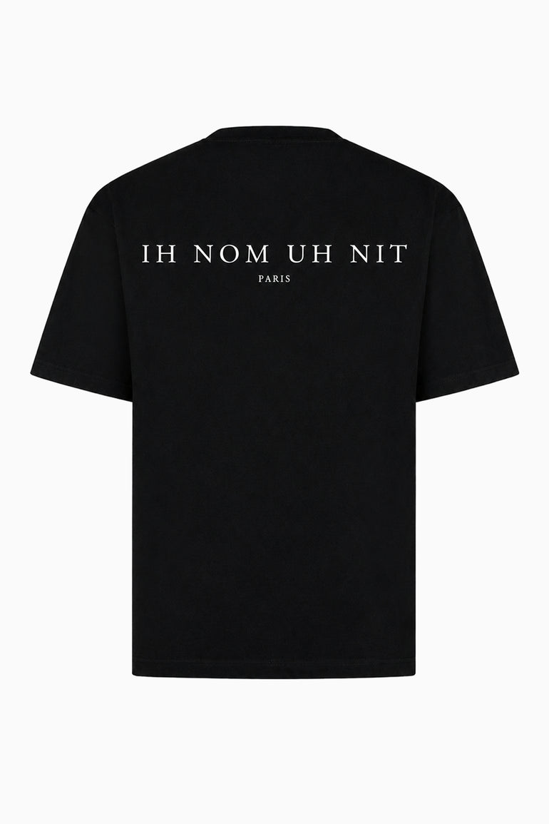 IH NOM UH NIT FW26 black cotton T-shirt with contrasting white IH NOM UH NIT PARIS logo print across the upper back.