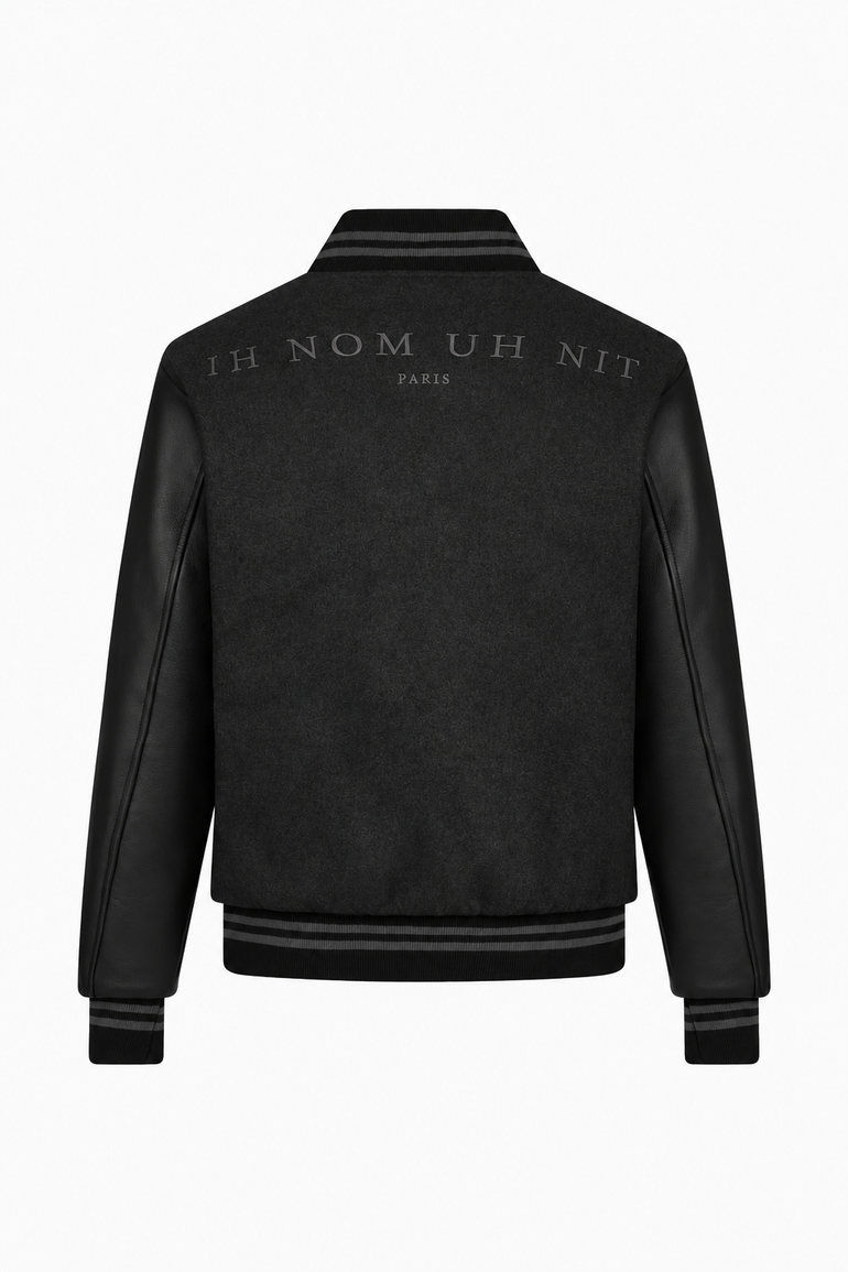 IH NOM UH NIT FW26 black Patch Varsity Jacket with leather sleeves and tonal IH NOM UH NIT PARIS embroidery, back view