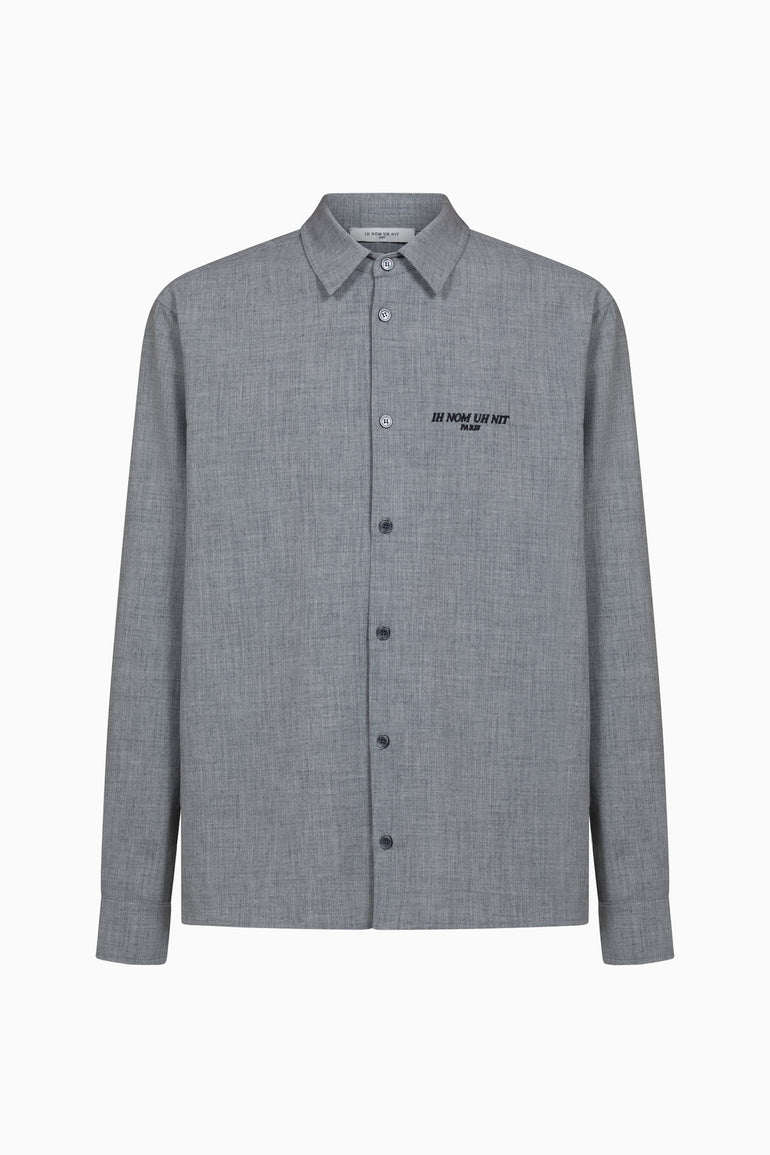 IH NOM UH NIT FW26 grey flannel shirt with small IH NOM UH NIT PARIS chest logo, front view