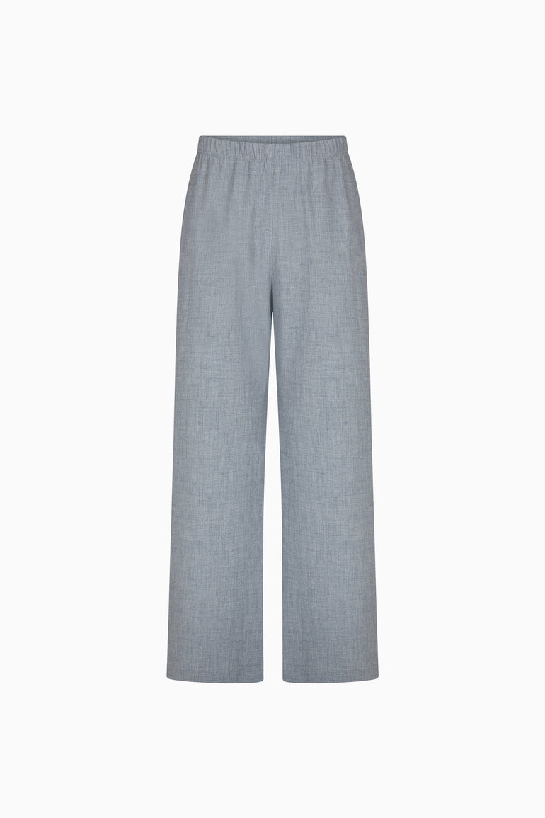 IH NOM UH NIT FW26 grey wide-leg flannel pants with elasticated waistband, front view