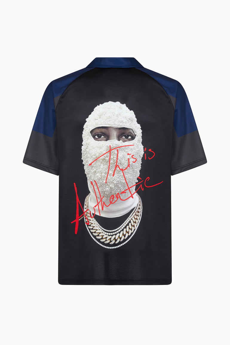 IH NOM UH NIT black technical short sleeve football jersey with collegiate graphics and iconic Mask artwork on the back