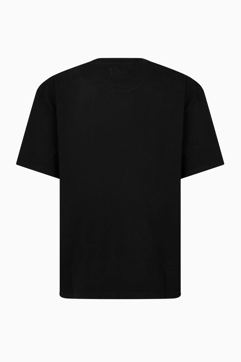 Black IH NOM UH NIT T-shirt featuring watch-face graphic with Roman numerals.